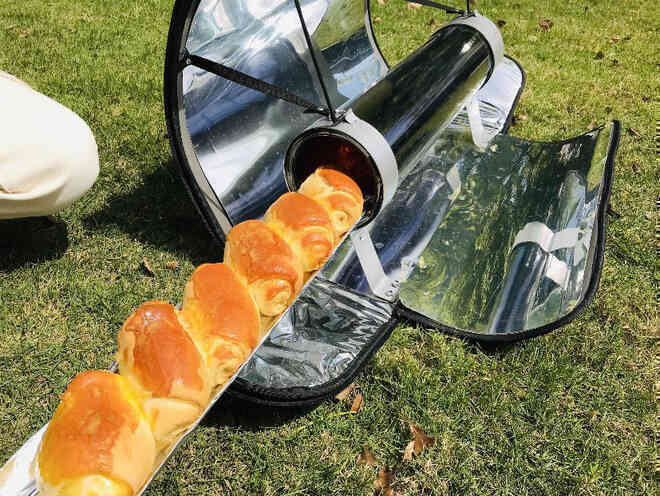 Ấn Độ: Cả ngôi làng nấu ăn bằng năng lượng mặt trời để cứu rừng - Ảnh 6. Ấn Độ: Cả ngôi làng nấu ăn bằng năng lượng mặt trời để cứu rừng - Ảnh 6.