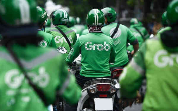 Mặc đại dịch, Grab đạt doanh thu cao chưa từng có - Ảnh 1. Mặc đại dịch, Grab đạt doanh thu cao chưa từng có - Ảnh 1.