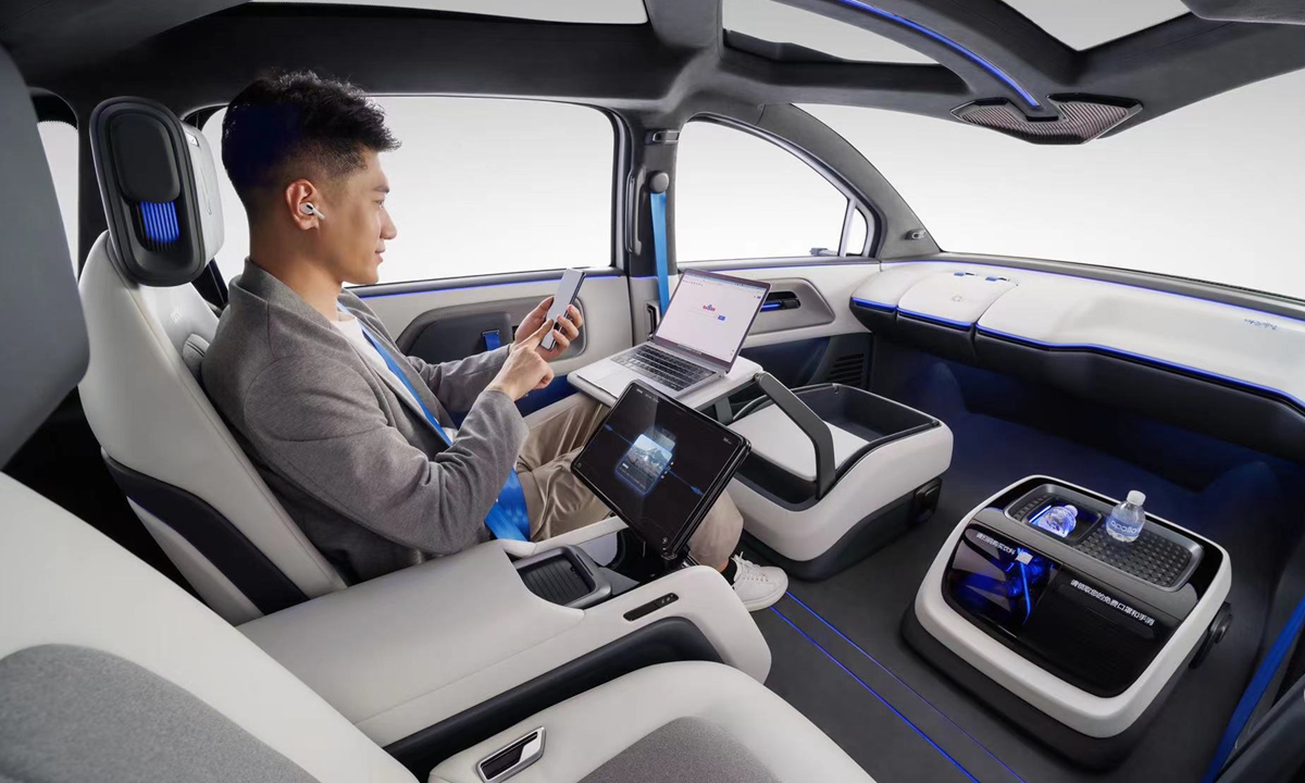 Baidu chính thức cung cấp dịch vụ robotaxi điện hoàn toàn không cần người lái với mẫu Apollo RT6 EV - Ảnh 4. Baidu chính thức cung cấp dịch vụ robotaxi điện hoàn toàn không cần người lái với mẫu Apollo RT6 EV - Ảnh 4.