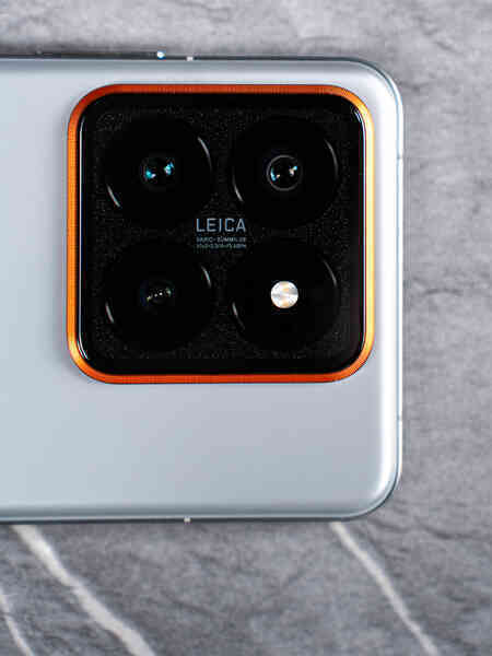 "Học tập" Apple, Xiaomi 14 Pro có thêm phiên bản viền Titan giống iPhone 15 Pro Max, giá đắt hơn - Ảnh 7. "Học tập" Apple, Xiaomi 14 Pro có thêm phiên bản viền Titan giống iPhone 15 Pro Max, giá đắt hơn - Ảnh 7.
