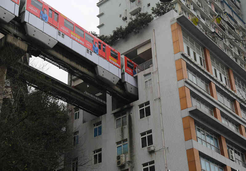 Tại sao các tuyến đường sắt của Trùng Khánh có thể đi xuyên qua các tòa nhà?- Ảnh 2. Tại sao các tuyến đường sắt của Trùng Khánh có thể đi xuyên qua các tòa nhà?- Ảnh 2.