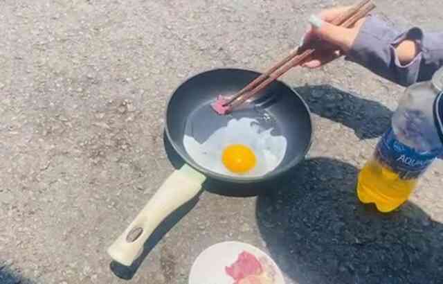 TikTok rộ trend rán trứng giữa trời nắng 40°C- Ảnh 2. TikTok rộ trend rán trứng giữa trời nắng 40°C- Ảnh 2.