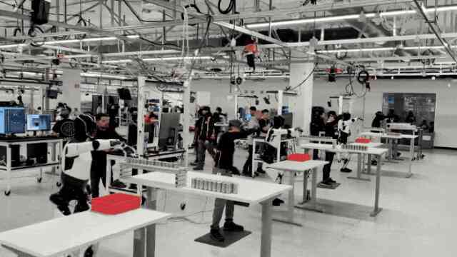 Robot hình người đang hoạt động trong nhà máy của Tesla như thế nào?- Ảnh 5.
