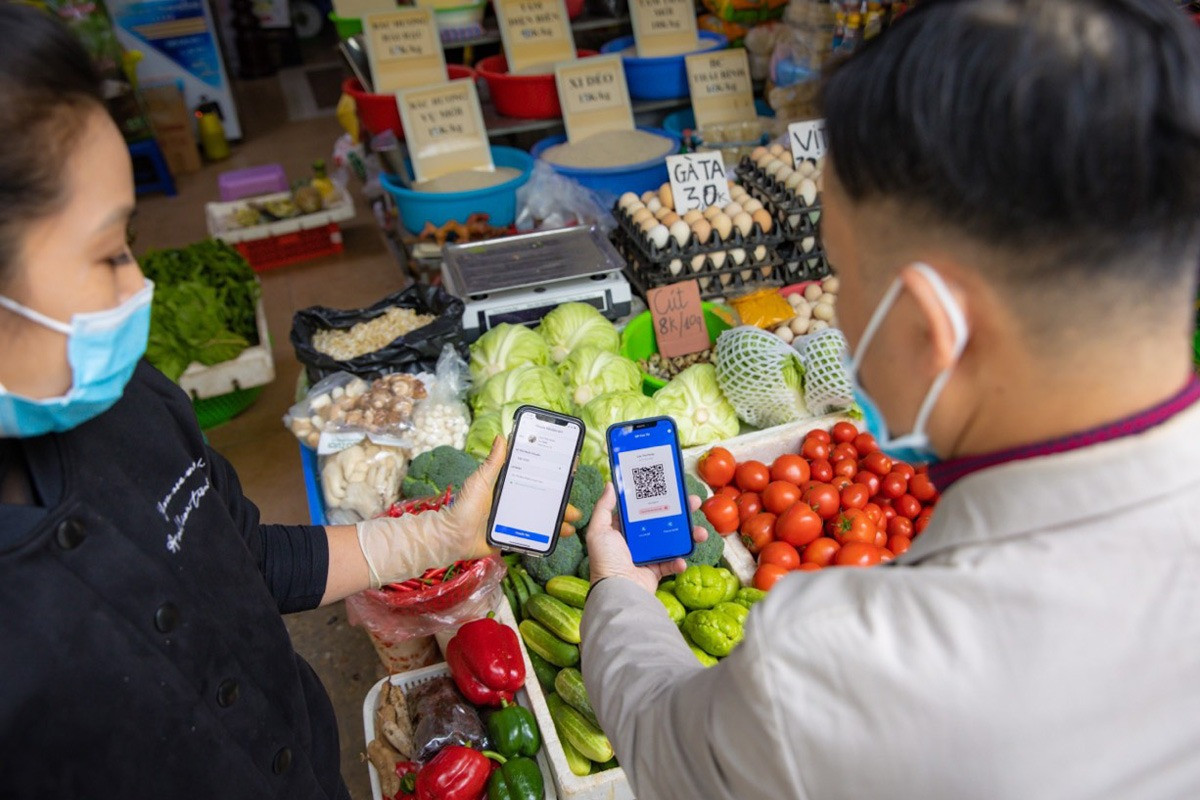 Tiếp tục thí điểm dịch vụ Mobile Money đến hết năm 2025