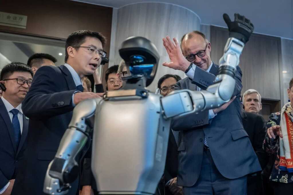 German Chancellor Friedrich Merz is given a tour of Unitree by CEO Wang Xingxing. Photo: DPA